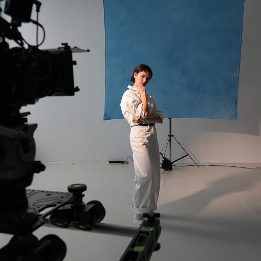 Actress in front of bluescreen